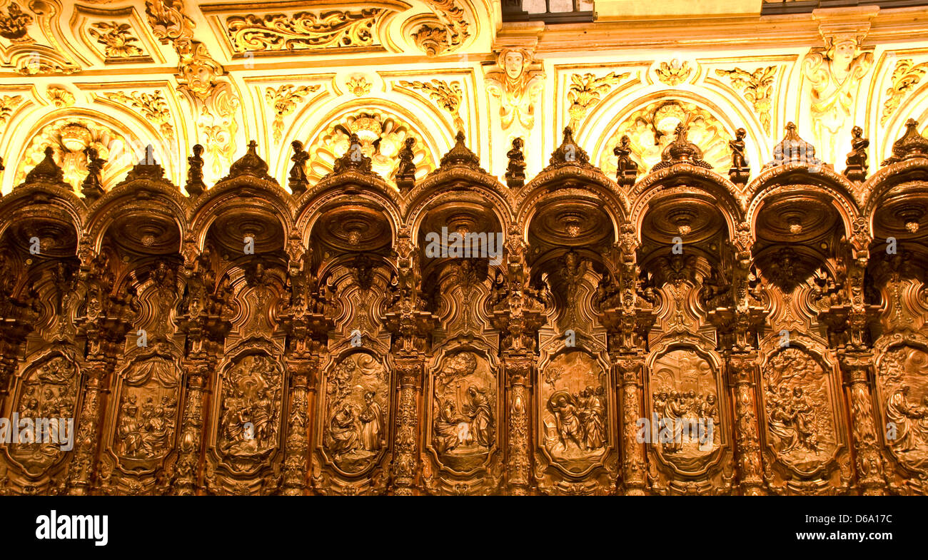 Illuminated mahogany choir stalls in La Mesquita mosque cathedral UNESCO world heritage site Cordoba Andalusia Andalucia Spain Stock Photo