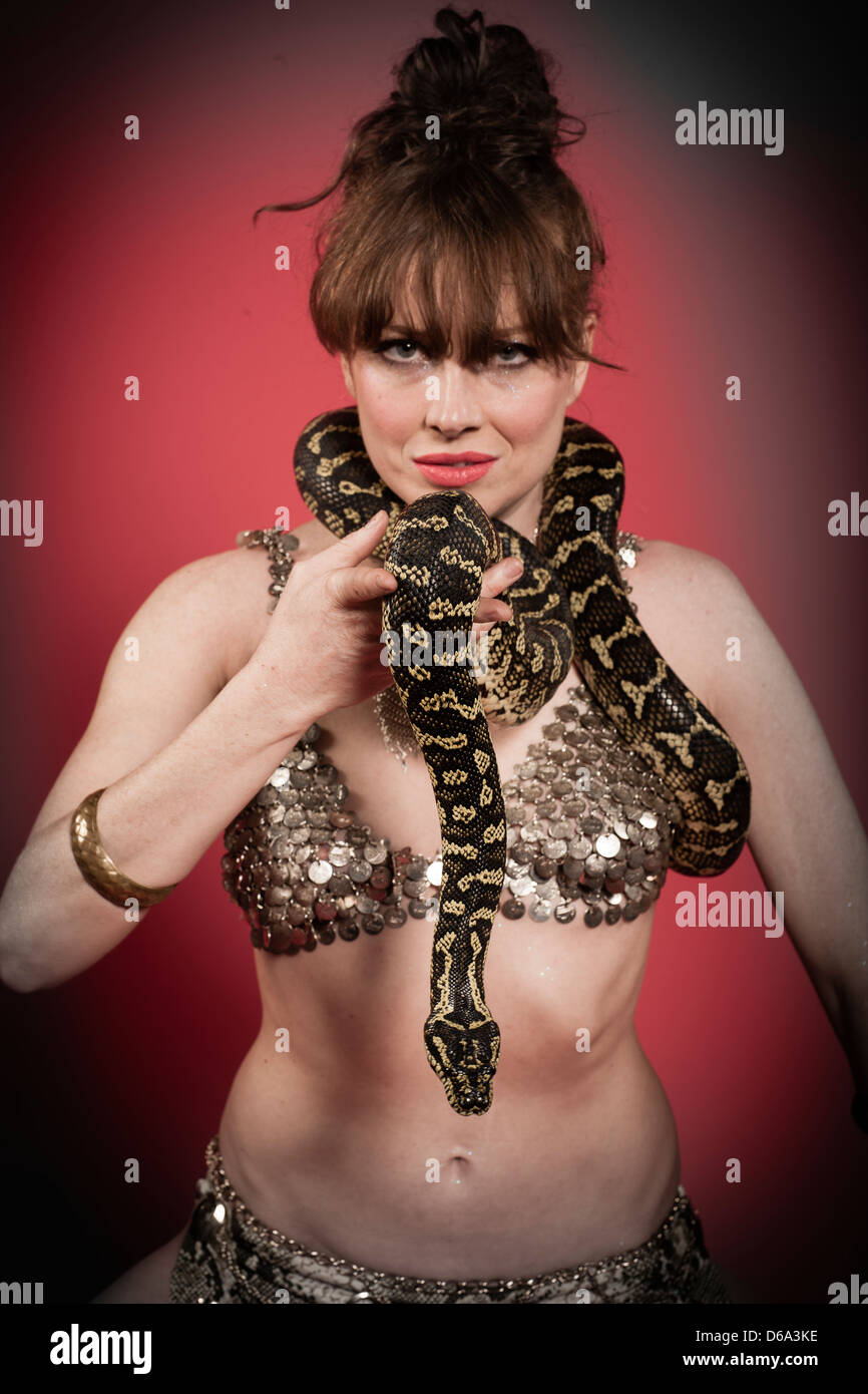 Belly dancer wearing snake Stock Photo