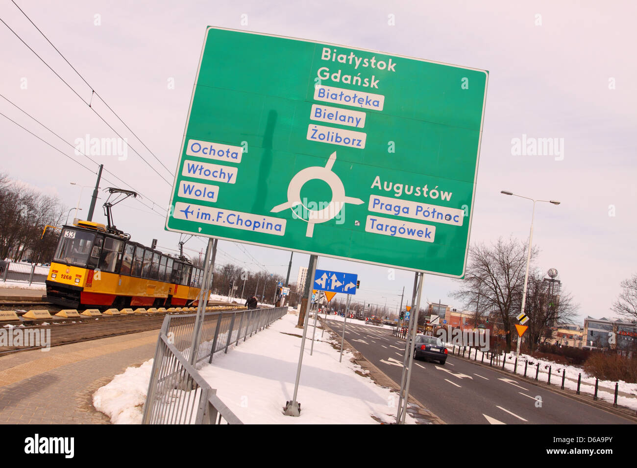 Warsaw Poland transport road traffic sign and driving in Warsaw roundabout and tram Stock Photo