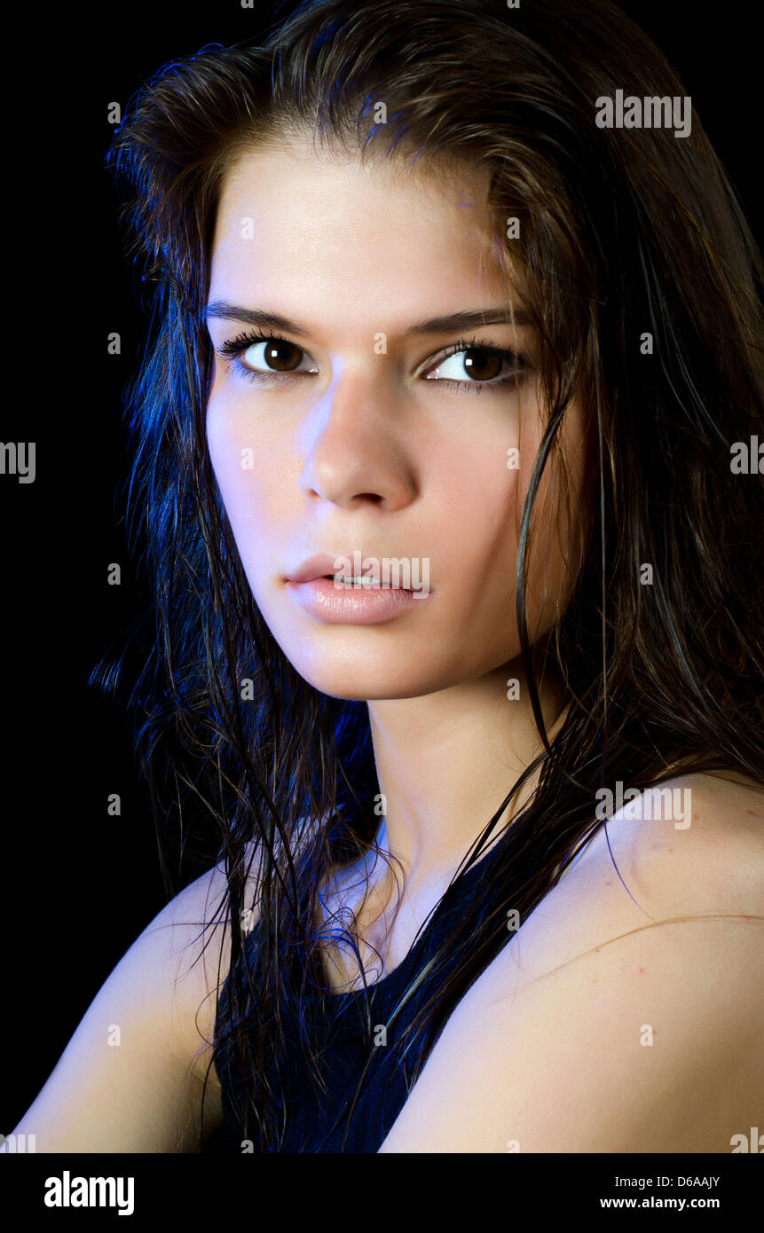 Portrait of young beautiful girl on black Stock Photo - Alamy