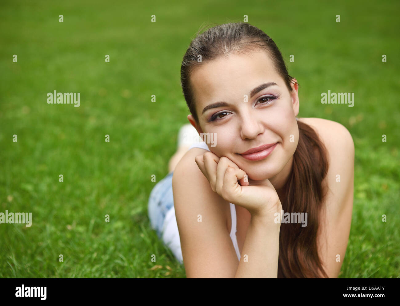 Beautiful young girl in summer park Stock Photo - Alamy