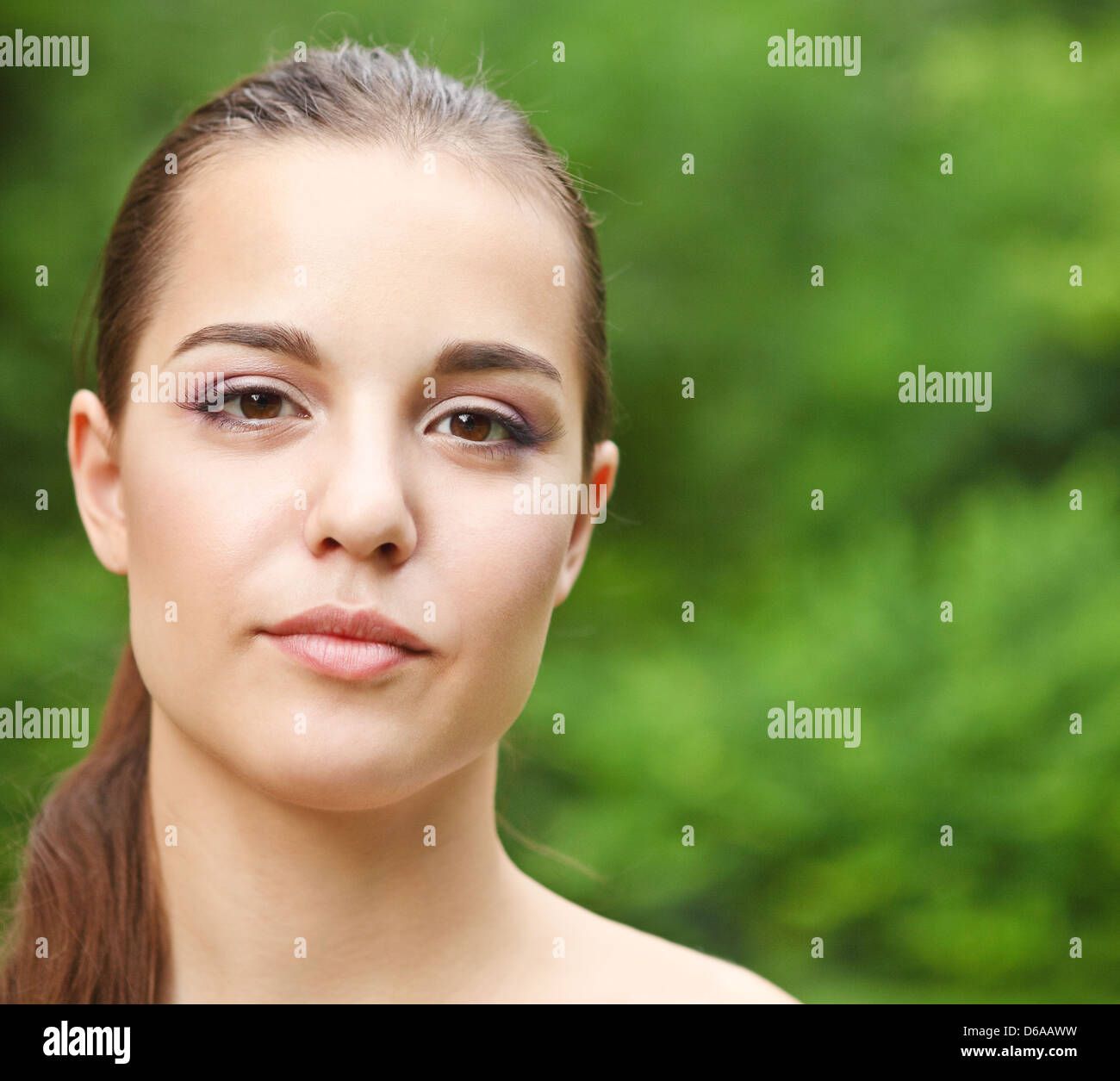 Beautiful young girl in summer park Stock Photo - Alamy