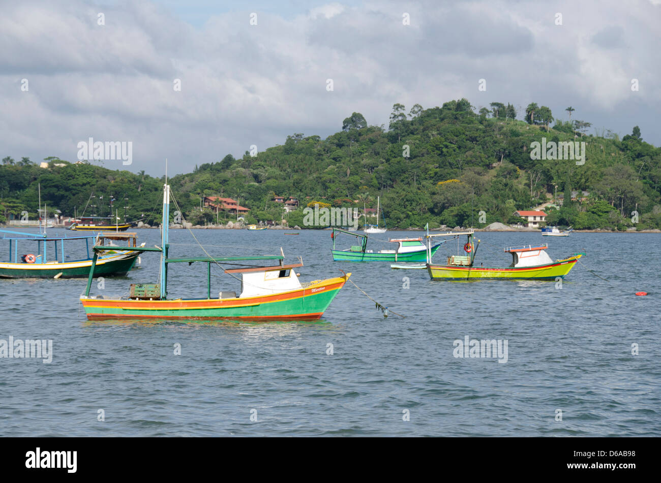 Brazil, state of Santa Catarina, Porto Belo. Colorful local fishing boats in the port area. Stock Photo