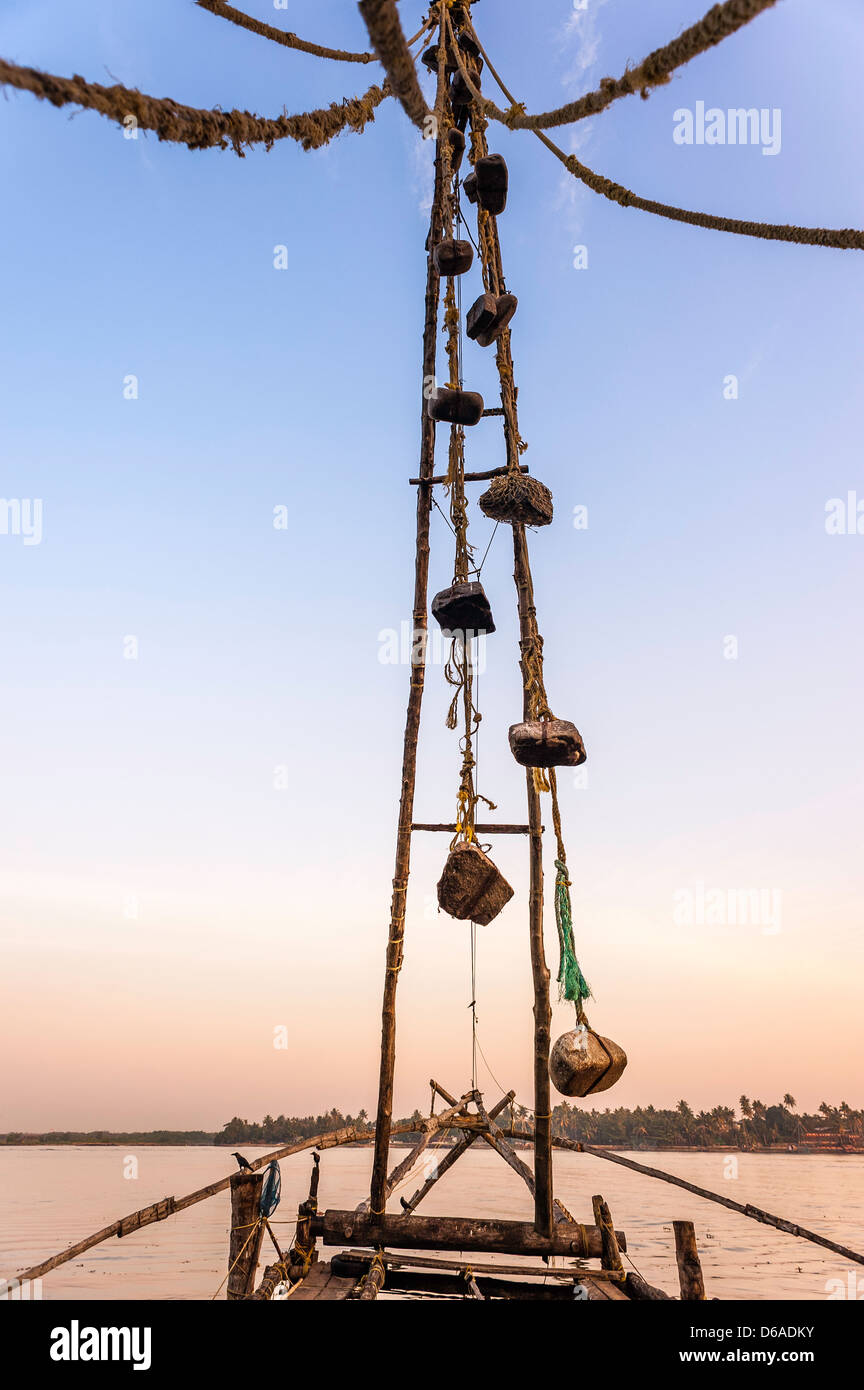 Chinese fishing net, ancient technology, showing large stones