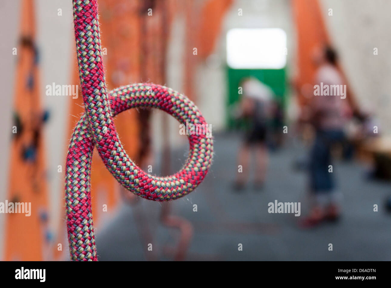 Detail of climbing rope on an indoor climbing wall. Stock Photo