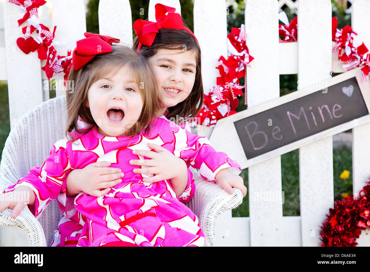 Two Sisters Dressed up for Valentine's Day Stock Photo