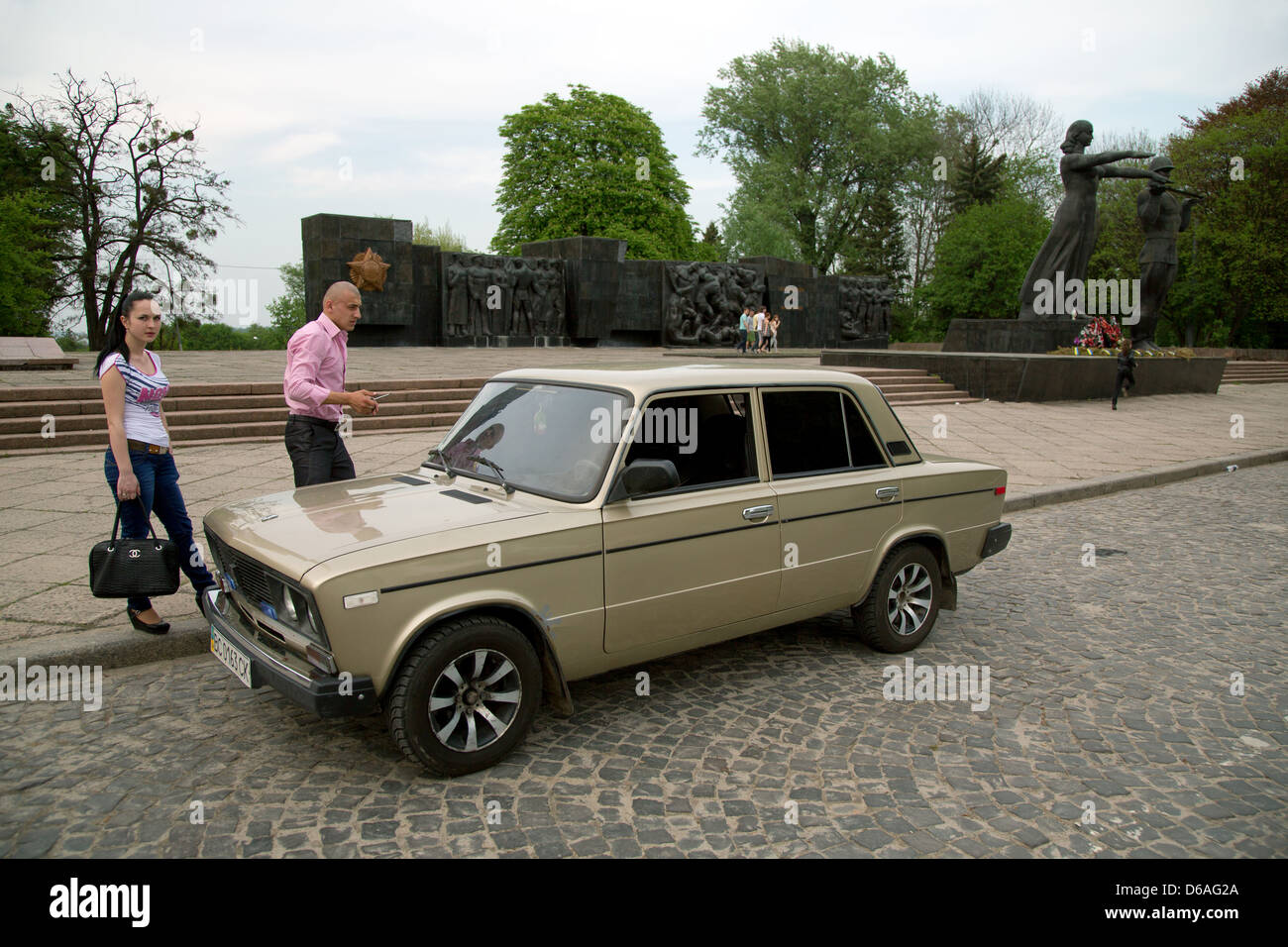 Lviv, Ukraine, on his golden young man screwed Lada Stock Photo