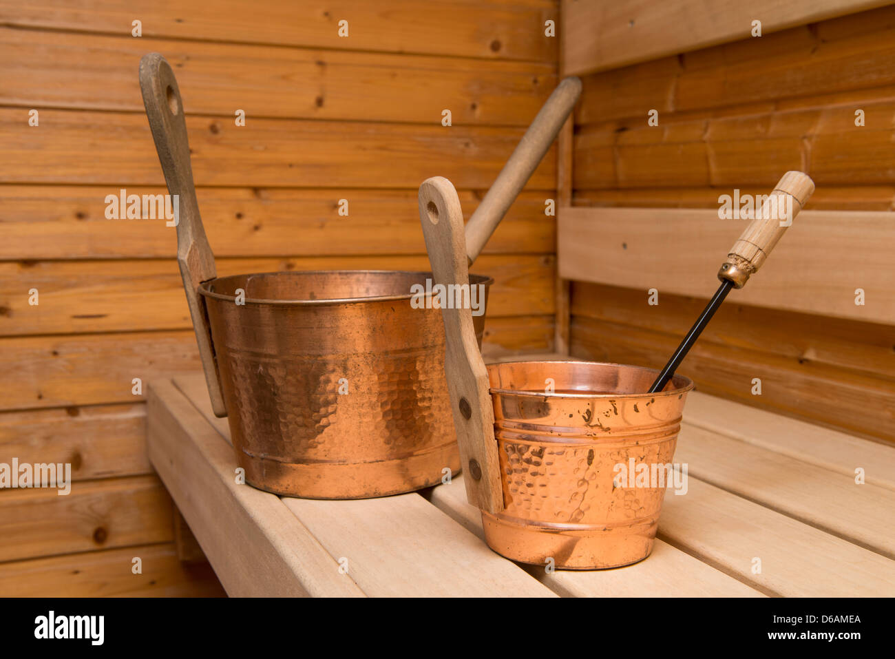 Two buckets for water with ladles in an interior of the Finnish sauna Stock Photo