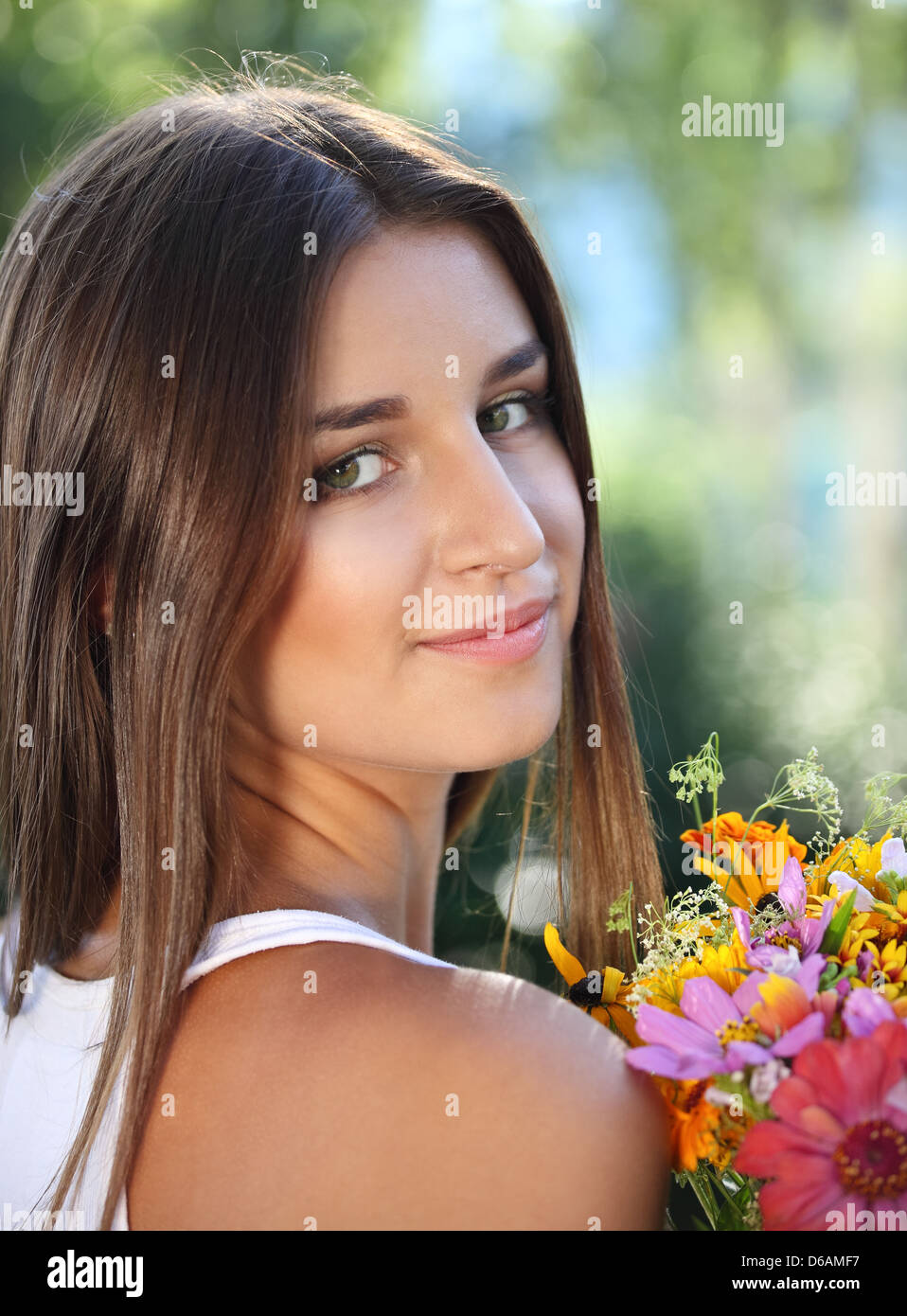 Beautiful young girl in summer park Stock Photo - Alamy