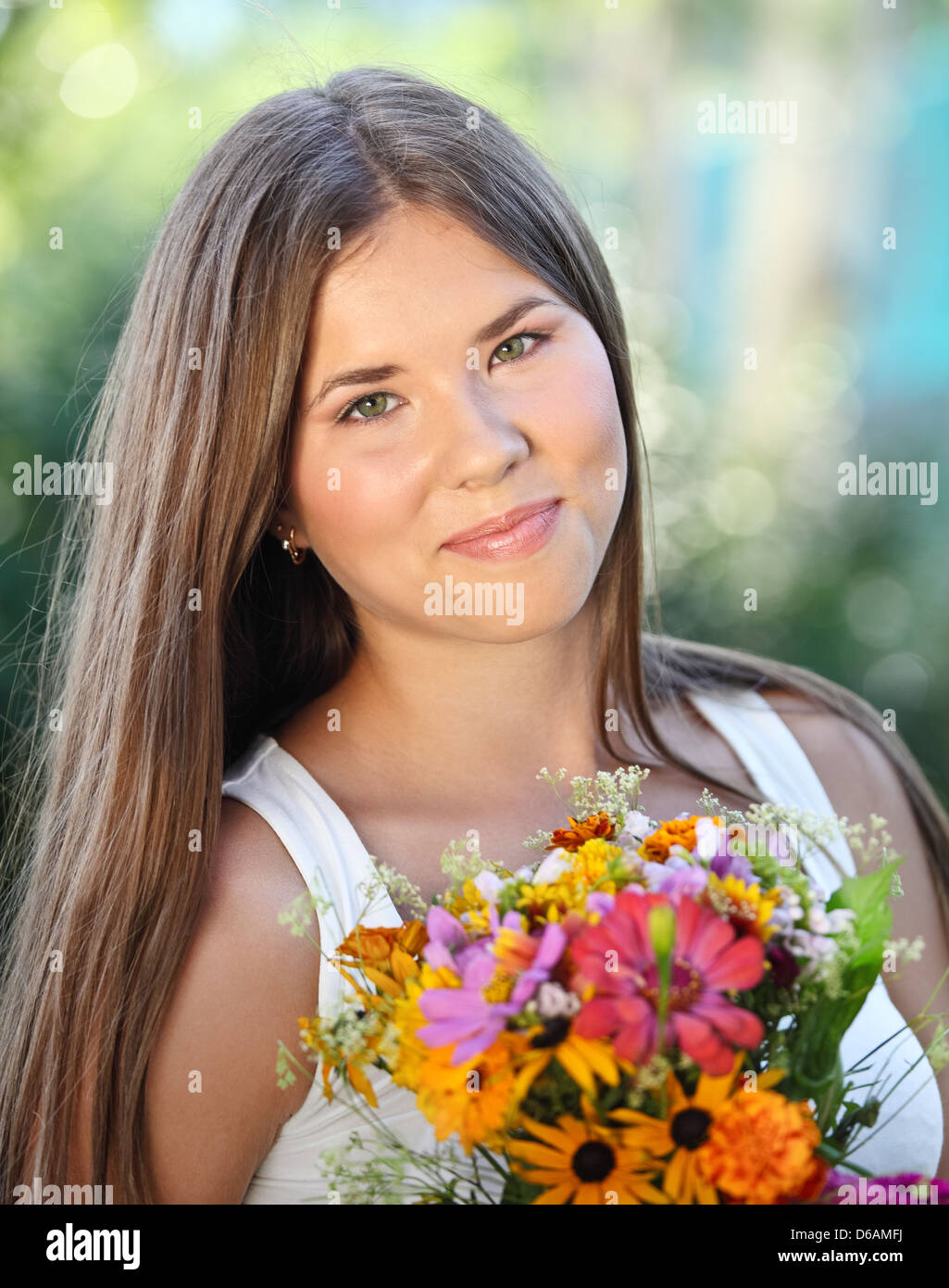 Beautiful young girl in summer park Stock Photo - Alamy