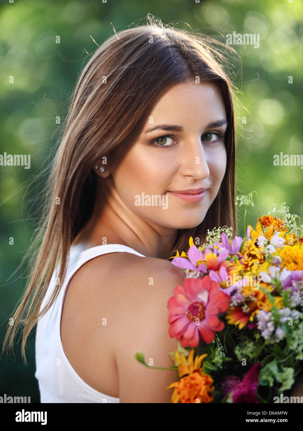 Beautiful young girl in summer park Stock Photo - Alamy