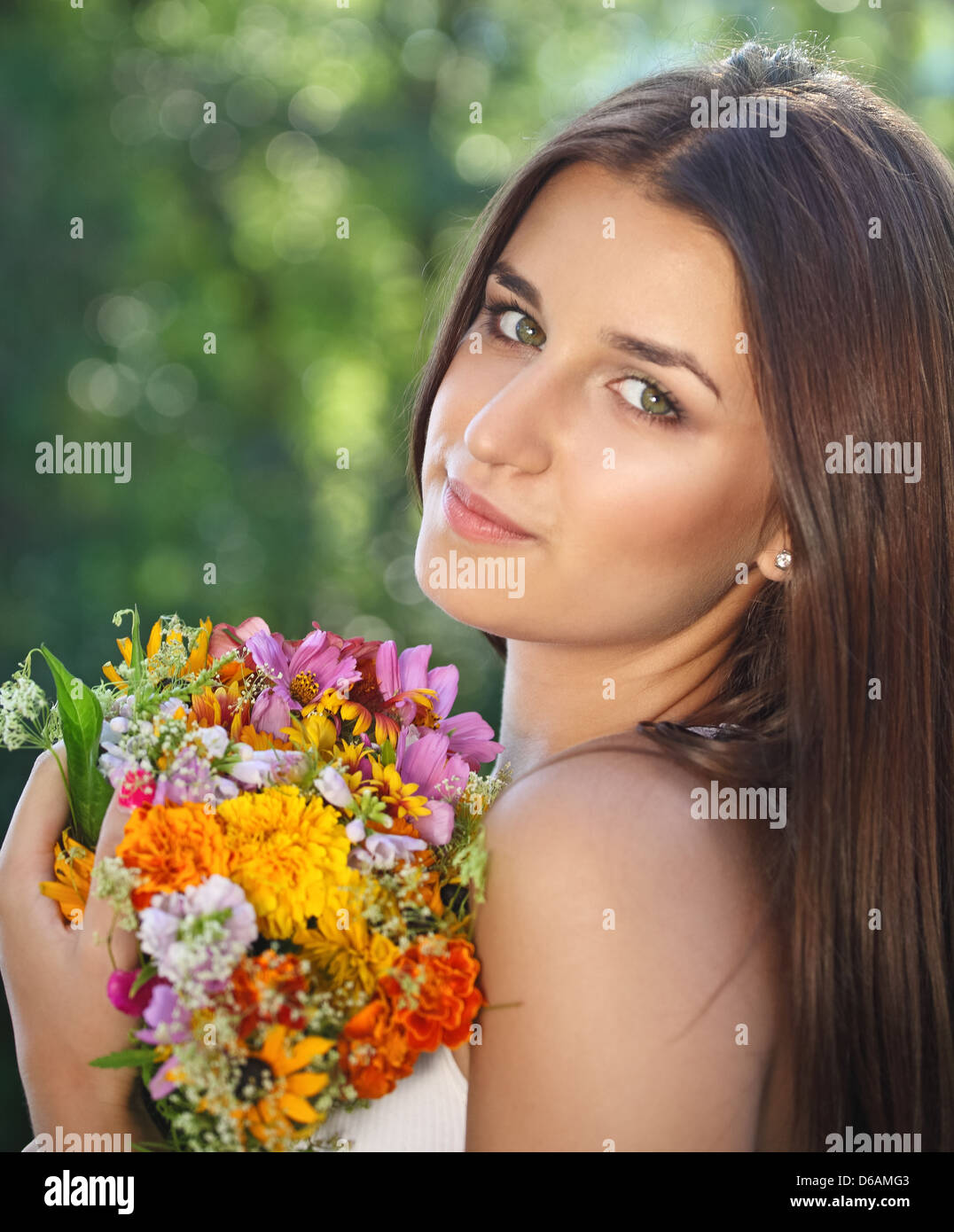 Beautiful young girl in summer park Stock Photo - Alamy