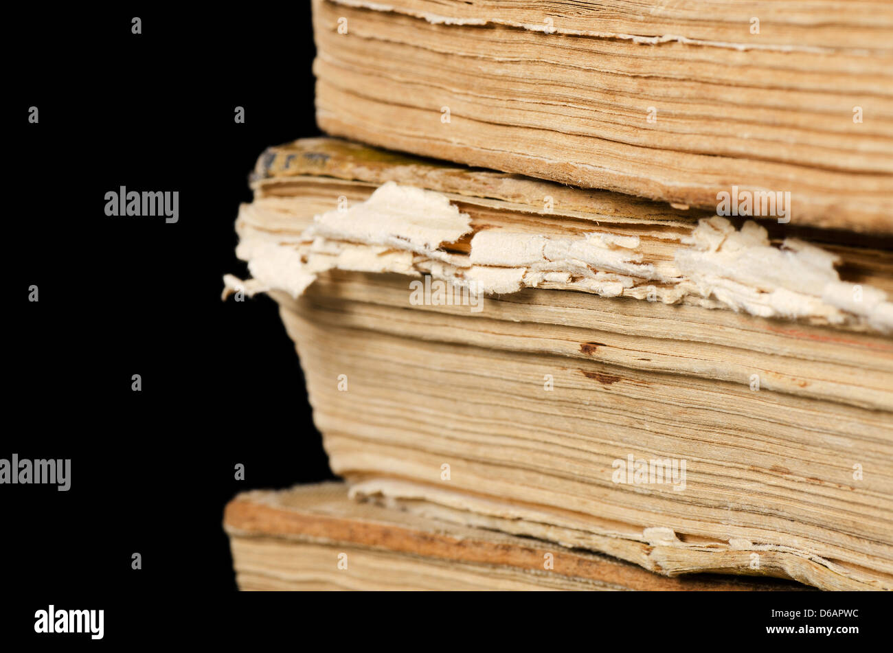 Pile of old books on black Stock Photo Alamy
