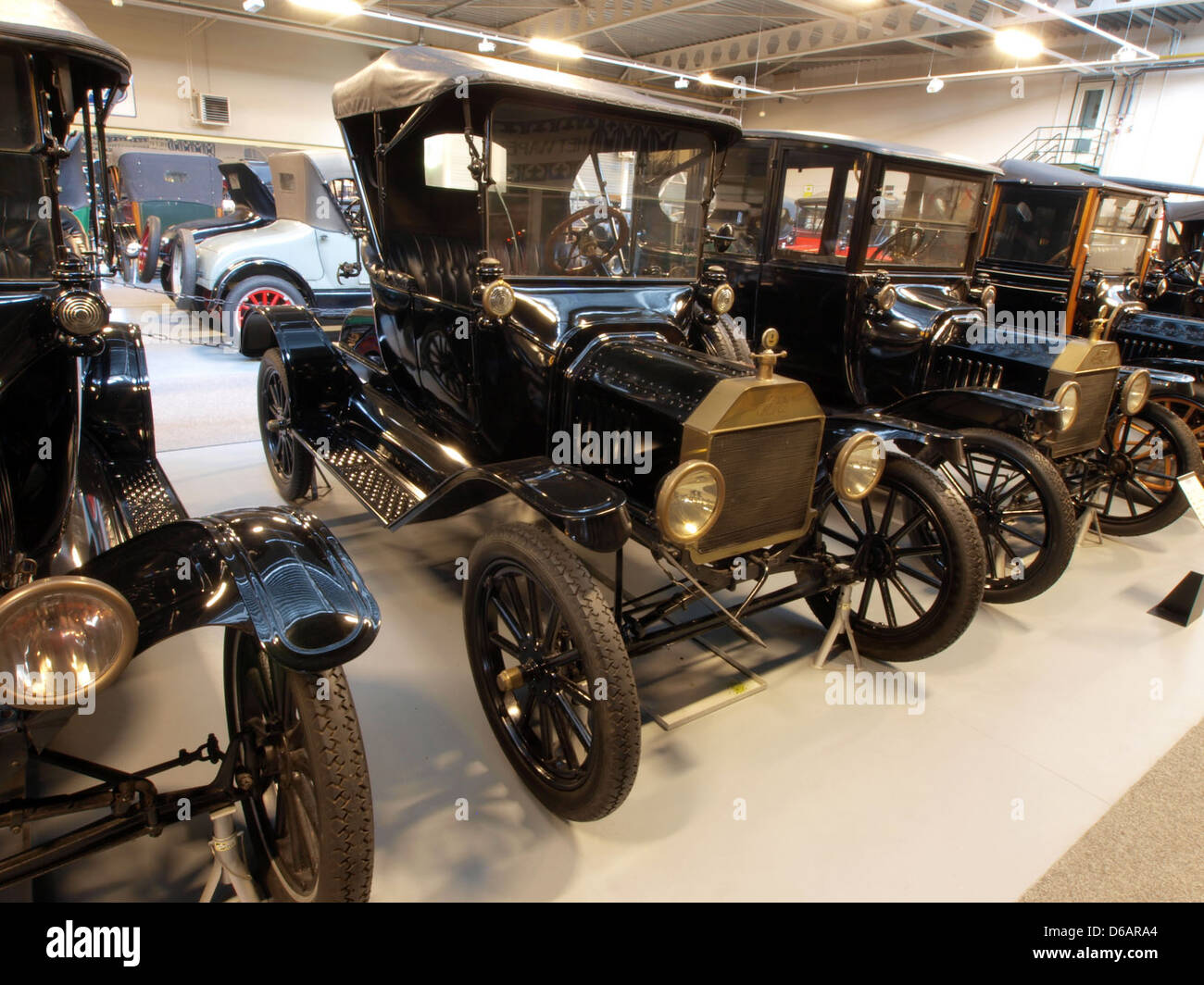 The 1916 Ford T Runabout is a two-seater variant of Ford's Model T, known for its affordability and reliability. This vehicle was part of Ford's effort to make automobiles accessible to the general public during the early 20th century. Stock Photo