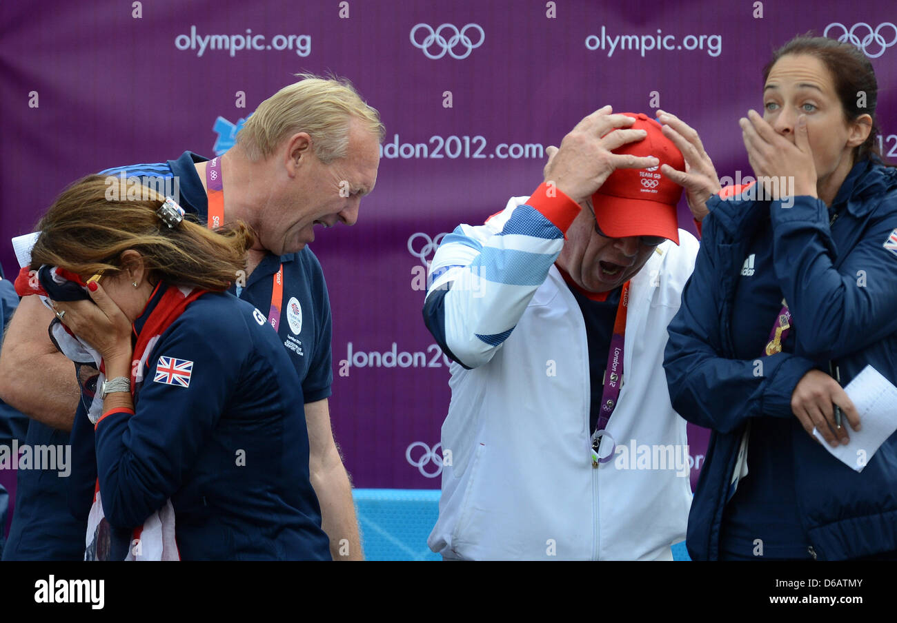 The british jumping team watches Nick Skelton missing a jump with his horse Big Star in the London 2012 olympic jumping competition at Greenwich Park in London, Britain, 08 August 2012. Photo: Jochen Luebke dpa  +++(c) dpa - Bildfunk+++ Stock Photo