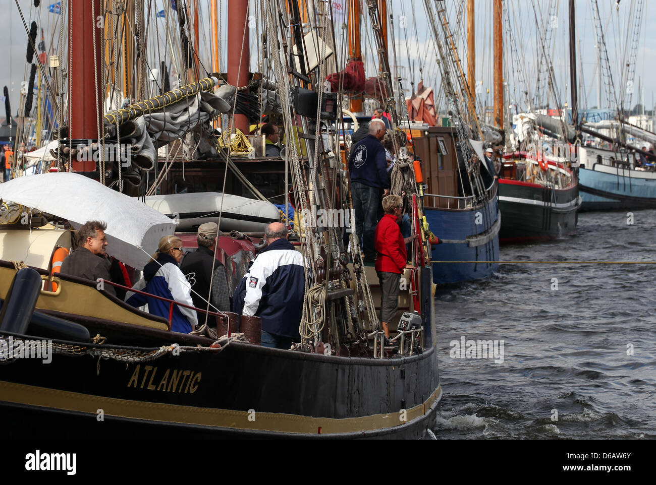 At the city harbor, the first ships go for a trip at the 22nd Hanse Sail festival in Rostock, Germany, 09 August 2012. The maritime festival runs from 09 until 12 August 2012 and features 170 traditional and museum ships. Photo: BERND WUESTNECK Stock Photo