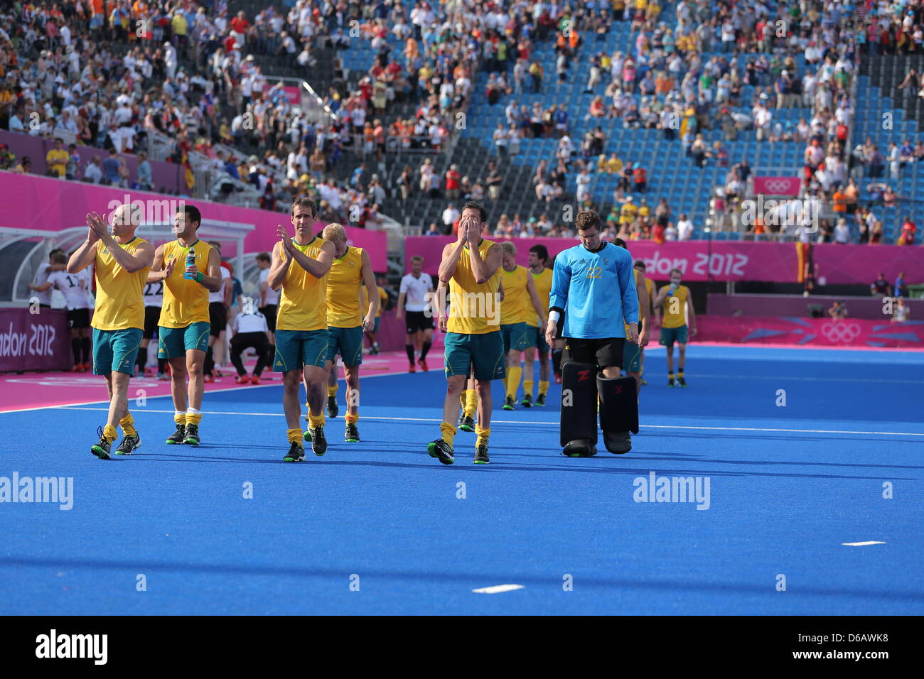Australia's field hockey player walk over the pitch following the Men's