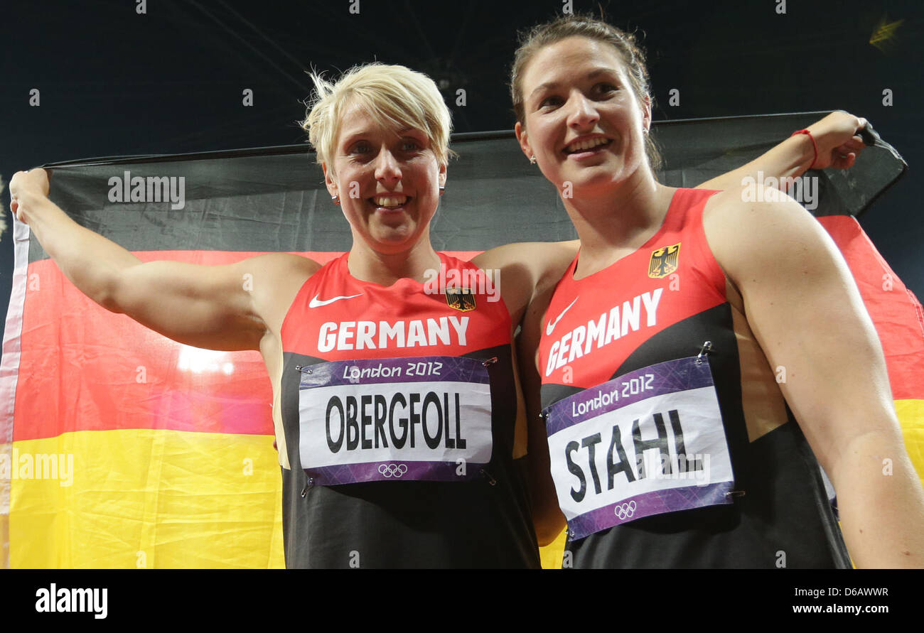 Silver medalist Christina Obergfoell (L) and bronze medalist Linda Stahl of Germany celebrate after the Women's Javelin Throw final at the London 2012 Olympic Games Athletics, Track and Field events at the Olympic Stadium, London, Great Britain, 09 August 2012. Photo: Michael Kappeler dpa  +++(c) dpa - Bildfunk+++ Stock Photo