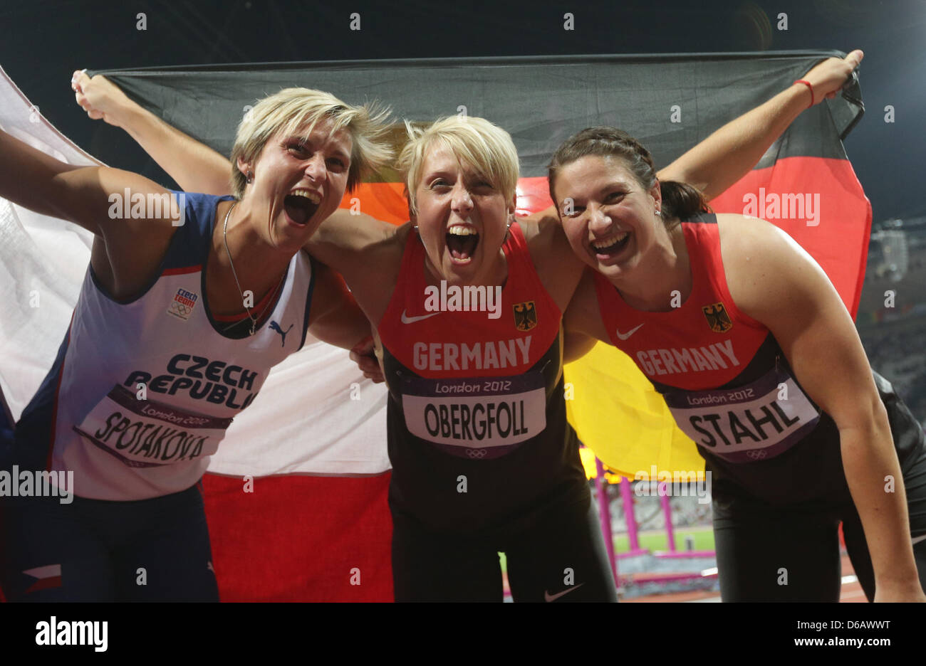 Gold mdedalist Barbora Spotakova (L-R) of Czech Republic, silver medalist Christina Obergfoell and bronze medalist Linda Stahl of Germany celebrate after the Women's Javelin Throw final at the London 2012 Olympic Games Athletics, Track and Field events at the Olympic Stadium, London, Great Britain, 09 August 2012. Photo: Michael Kappeler dpa  +++(c) dpa - Bildfunk+++ Stock Photo