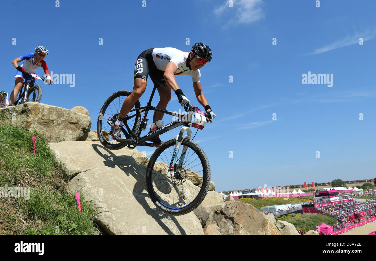 Sabine Spitz of Germany in action during the Women's Cross-country Final of  the Cycling Mountain Bike event in Hadleigh Farm at the London 2012 Olympic  Games, London, Great Britain, 11 August 2012.