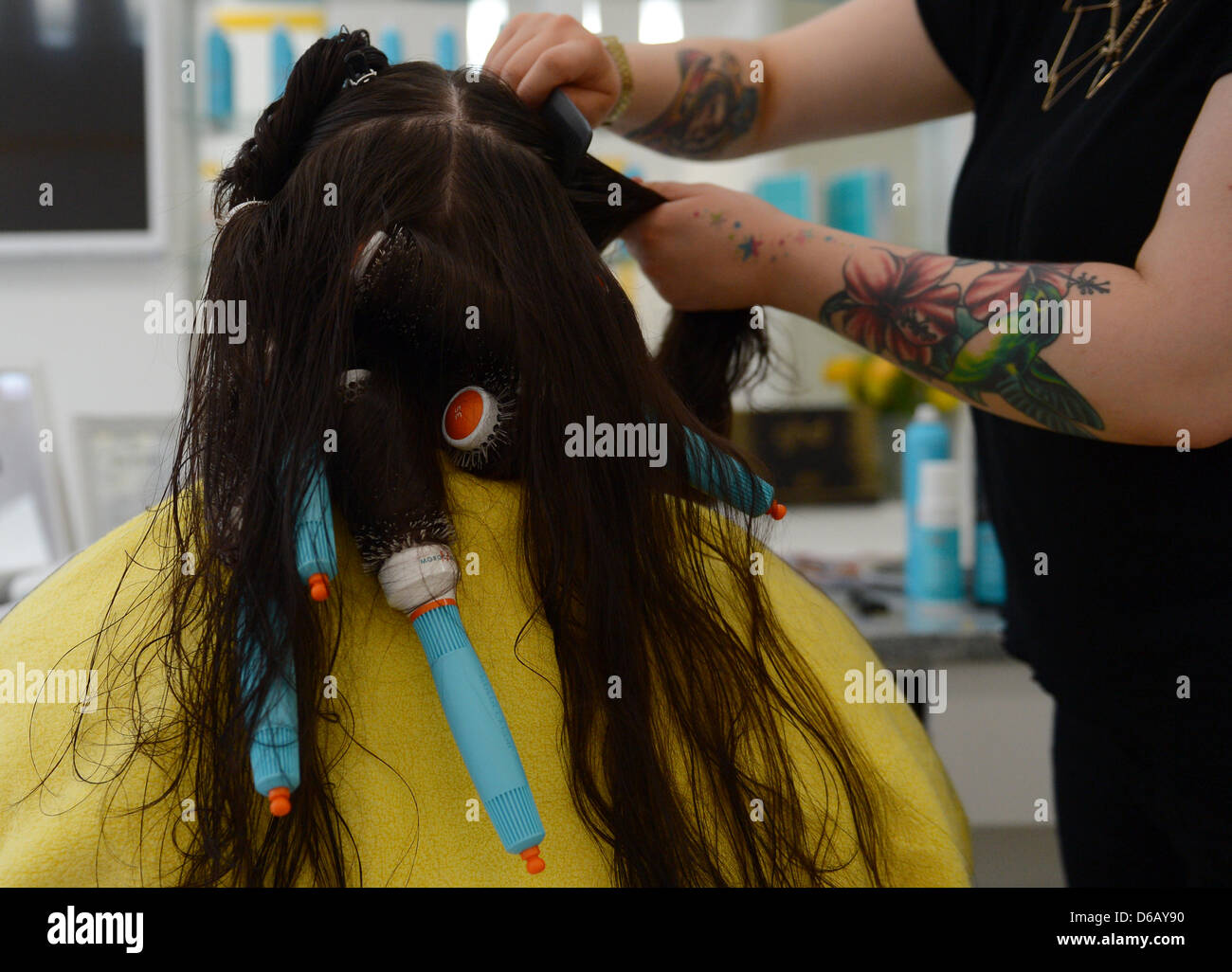 Hair Dresser Jenny Combs Hair Of A Customer At The Dry Bar In