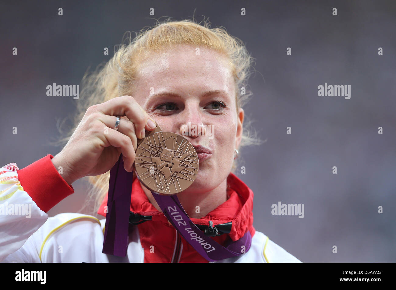 Bronze medalist Betty Heidler of Germany during the medal ceremony for