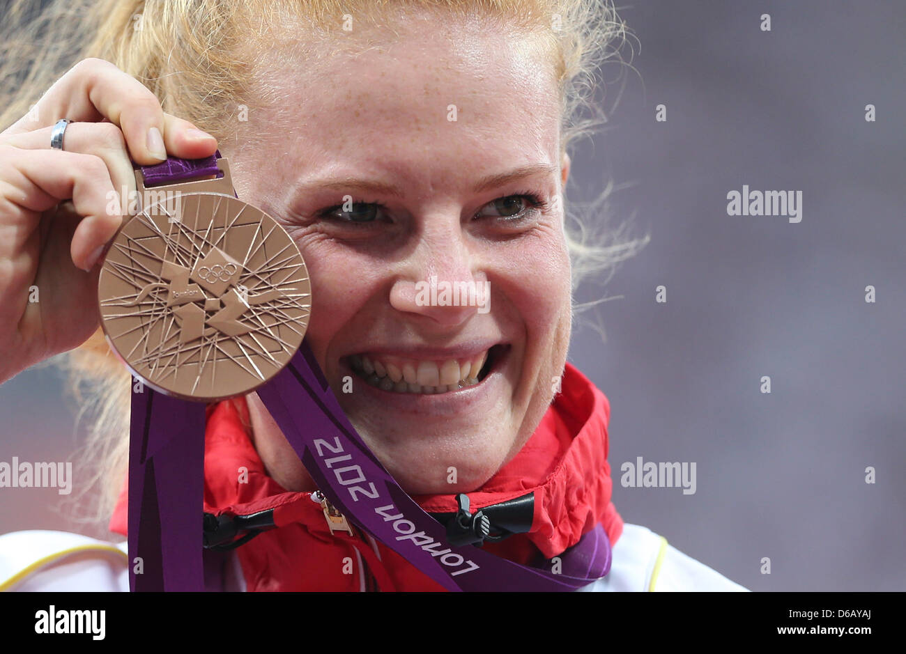 Bronze medalist Betty Heidler of Germany during the medal ceremony for