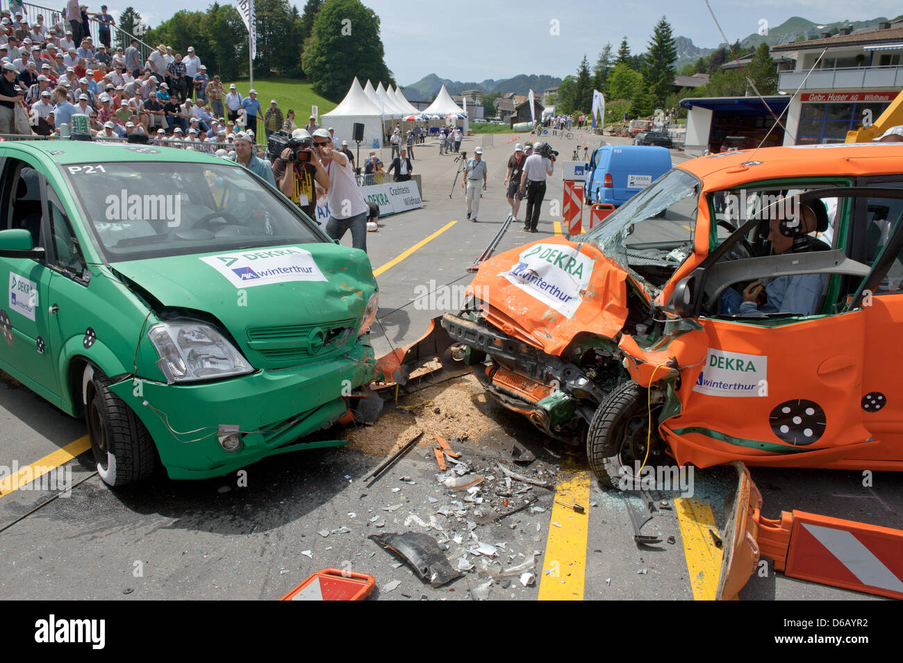 Two test vehichles sit on a Dekra test track after a crash test in  Wildhaus-Alt St. Johann, Switzerland, 28 June 2012. During the simulation,  a van crashed head-on into a car in