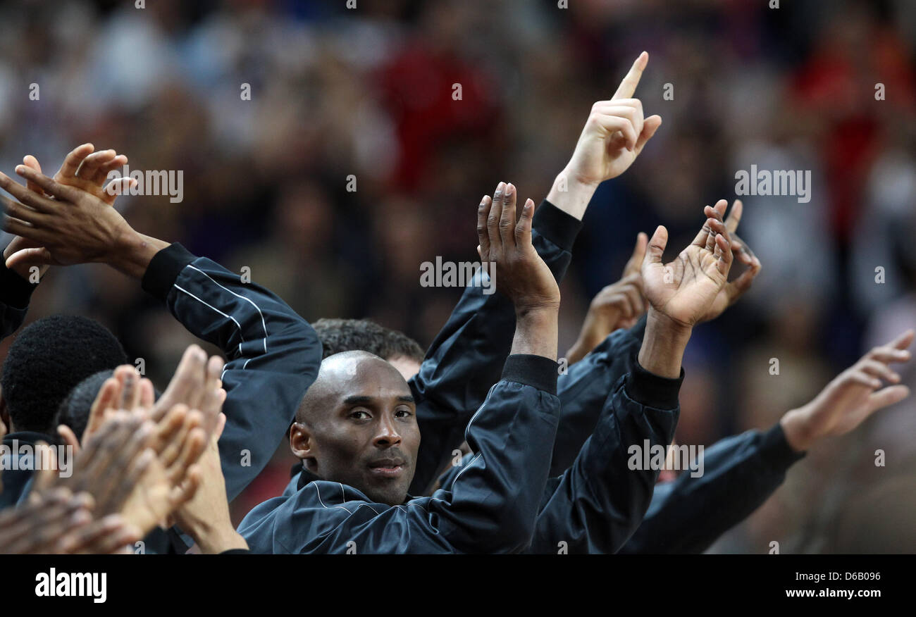 Kobe Bryant of the United States celebrate their gold medals during the medal ceremony after winning the basketball final game against Spain in North Greenwich Arena at the London 2012 Olympic Games, London, Great Britain, 12 August 2012. Photo: Friso Gentsch dpa Stock Photo
