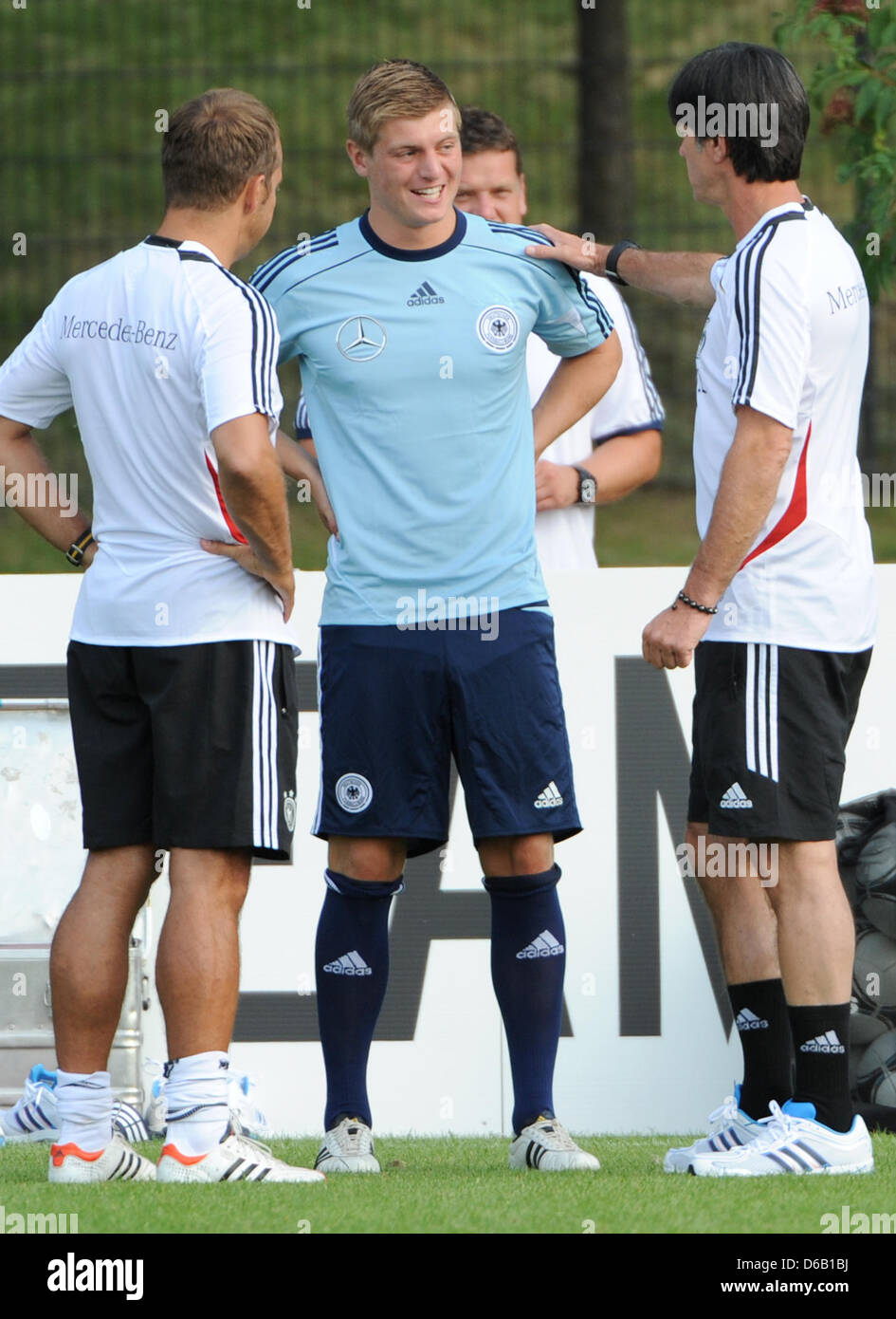 German national soccer coach Joachim Loew (R) and assistant coach Hansi