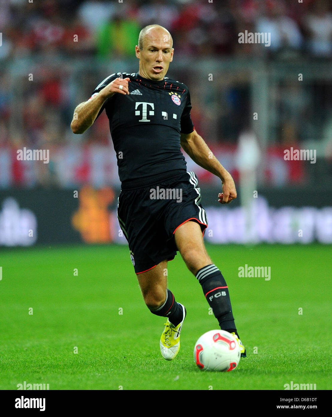 Munich's Arjen Robben plays the ball during the DFL Super Cup final match between FC Bayern Munich and Borussia Dortmund at the Allianz Arena in Munich, Germany, 12 August 2012. Photo: Thomas Eisenhuth Stock Photo