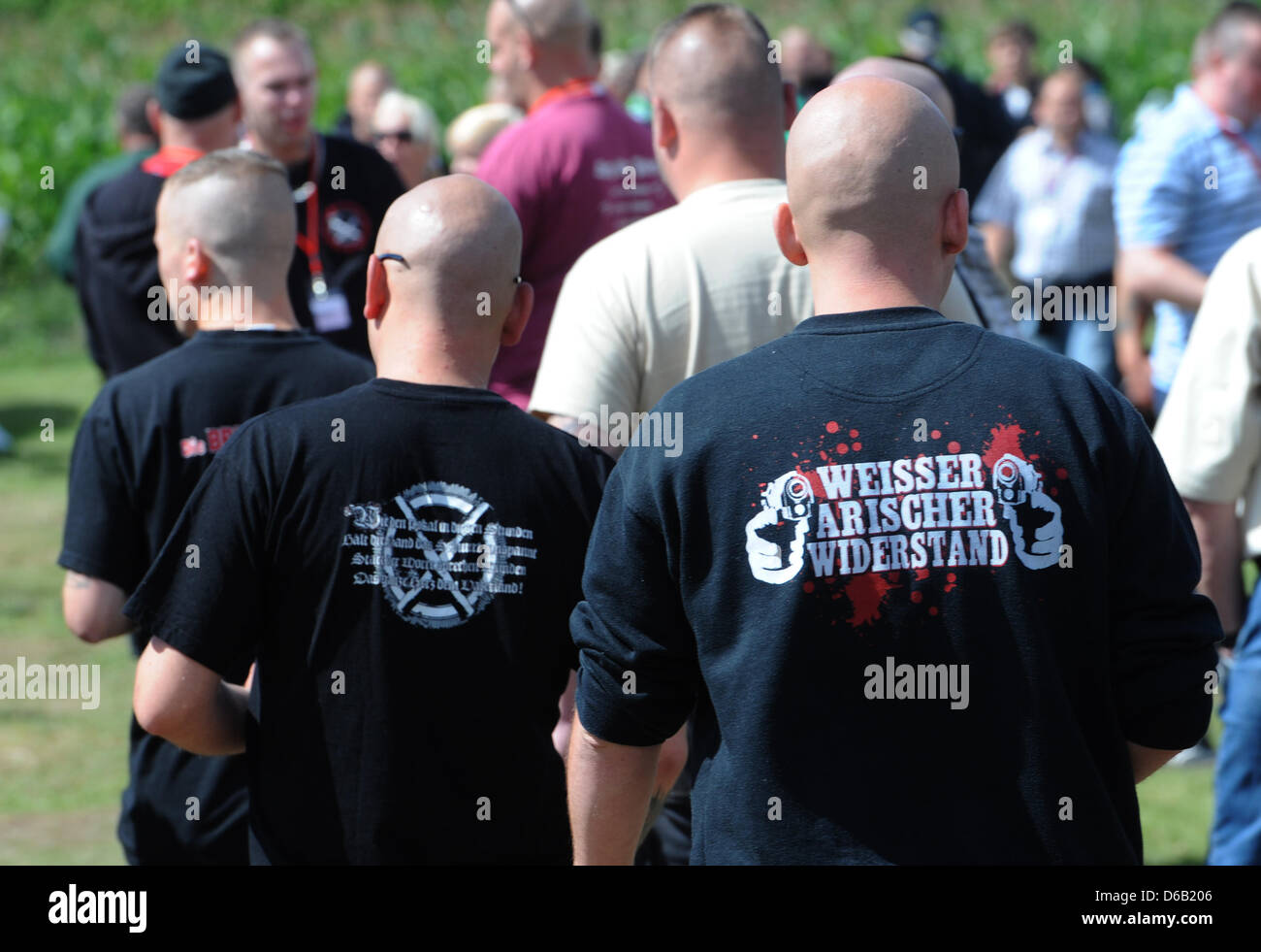 (FILE) An archive photo dated 11 August 2012 shows visitors to the 'Press Fest' by the far-right extremist journal 'Deutsche Stimme' ('German Voice') in Pasewalk, Germany. According to a report commissioned by the Amadeu Antonio Foundation, the police and politicians are downplaying the scale of far-right violence again and again only three-quarters of a year after the series of mu Stock Photo
