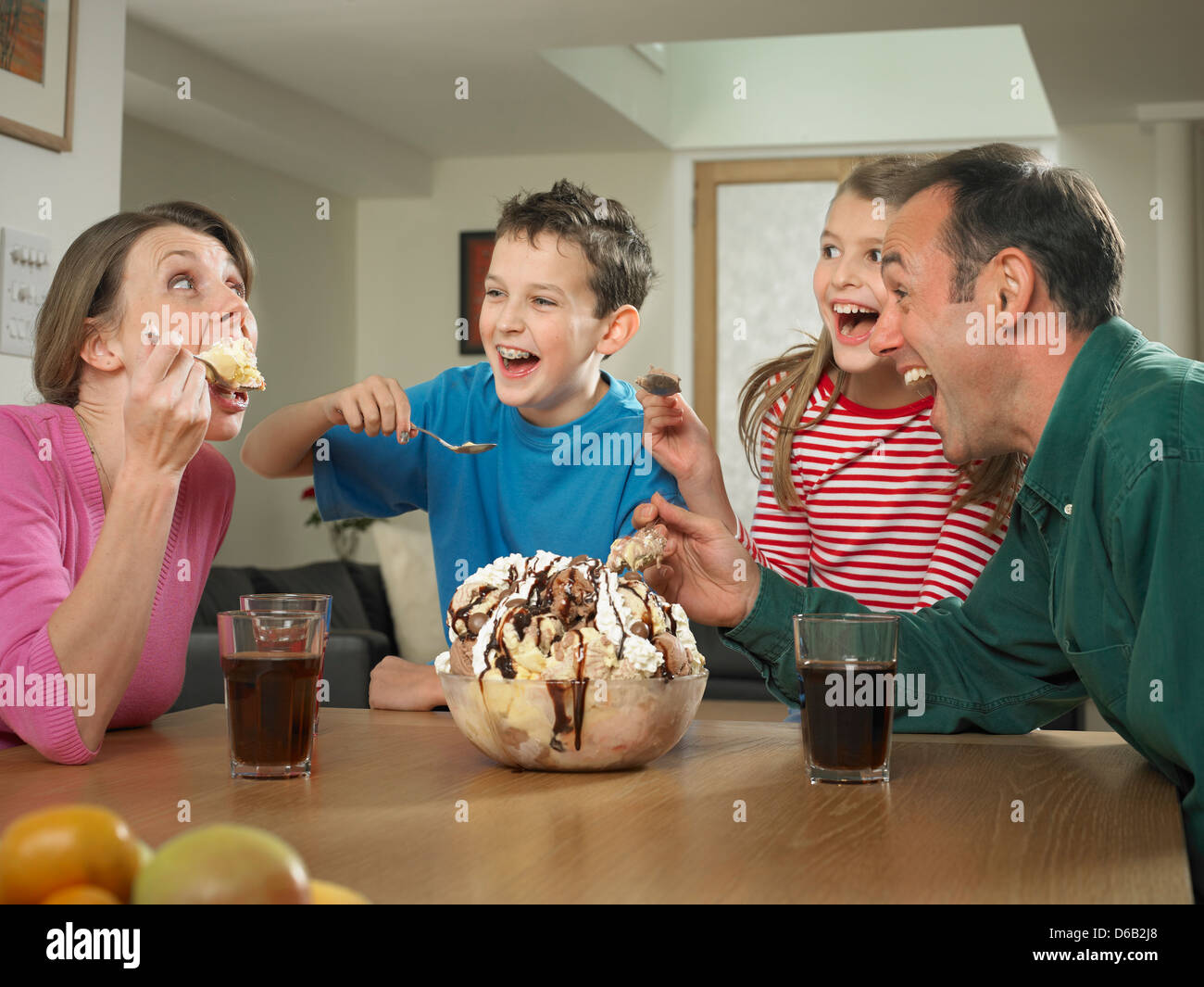 Family eating ice cream together Stock Photo