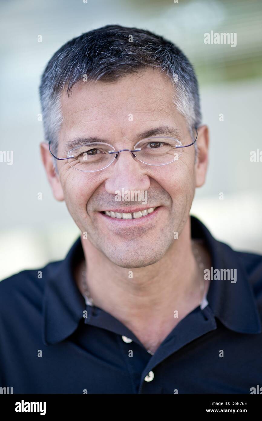 CEO of Adidas Herbert Hainer smiles at company headquarters in Herzogenaurach, Germany, 17 August 2012. Photo: David Ebener Stock Photo
