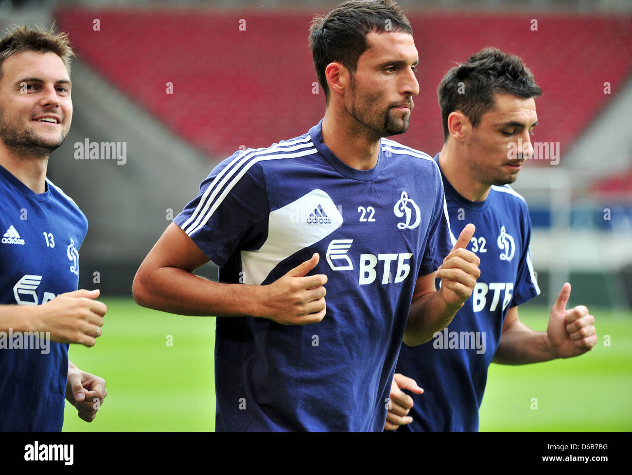 Dynamo Moscow's Vladimir Granat (L-R), Kevin Kuranyi and Marko Lomic practices at the Mercedes Benz Arena in Stuttgart, Germany, 21 August 2012. VfB Stuttgart will play Dynamo Moscow in the first leg of the fourth round of the qualifications for the Europa League on 22 August 2012. Photo: JAN-PHILIPP STROBEL Stock Photo
