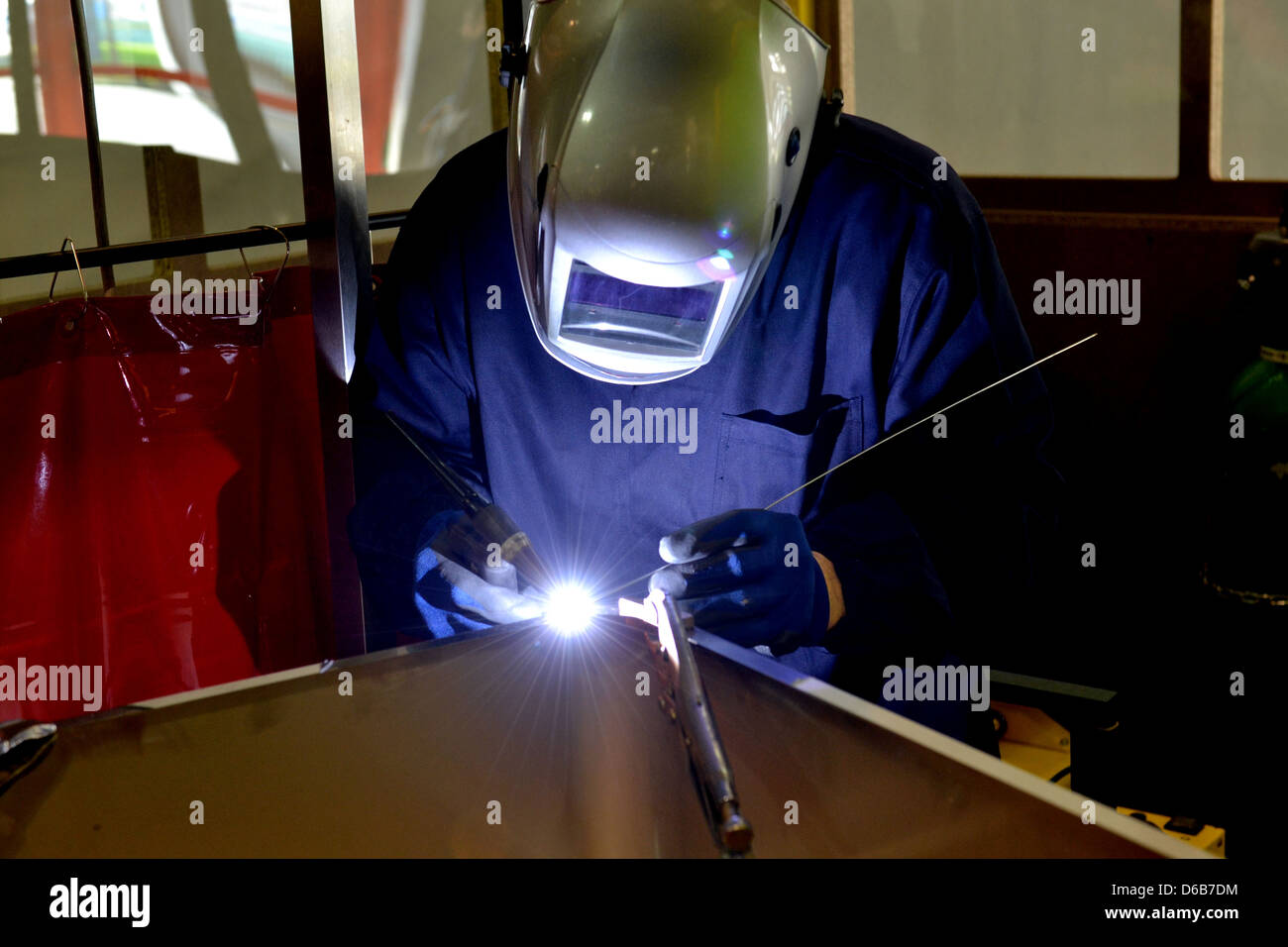 welder; welding; metalwork; male; masculine; m garment; dress; dressing