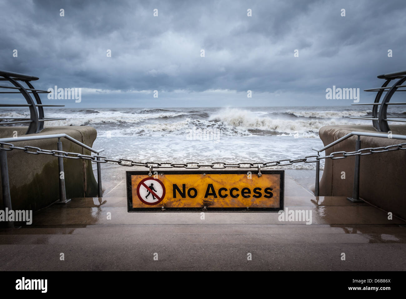 ''No access'' sign at stormy beach Stock Photo