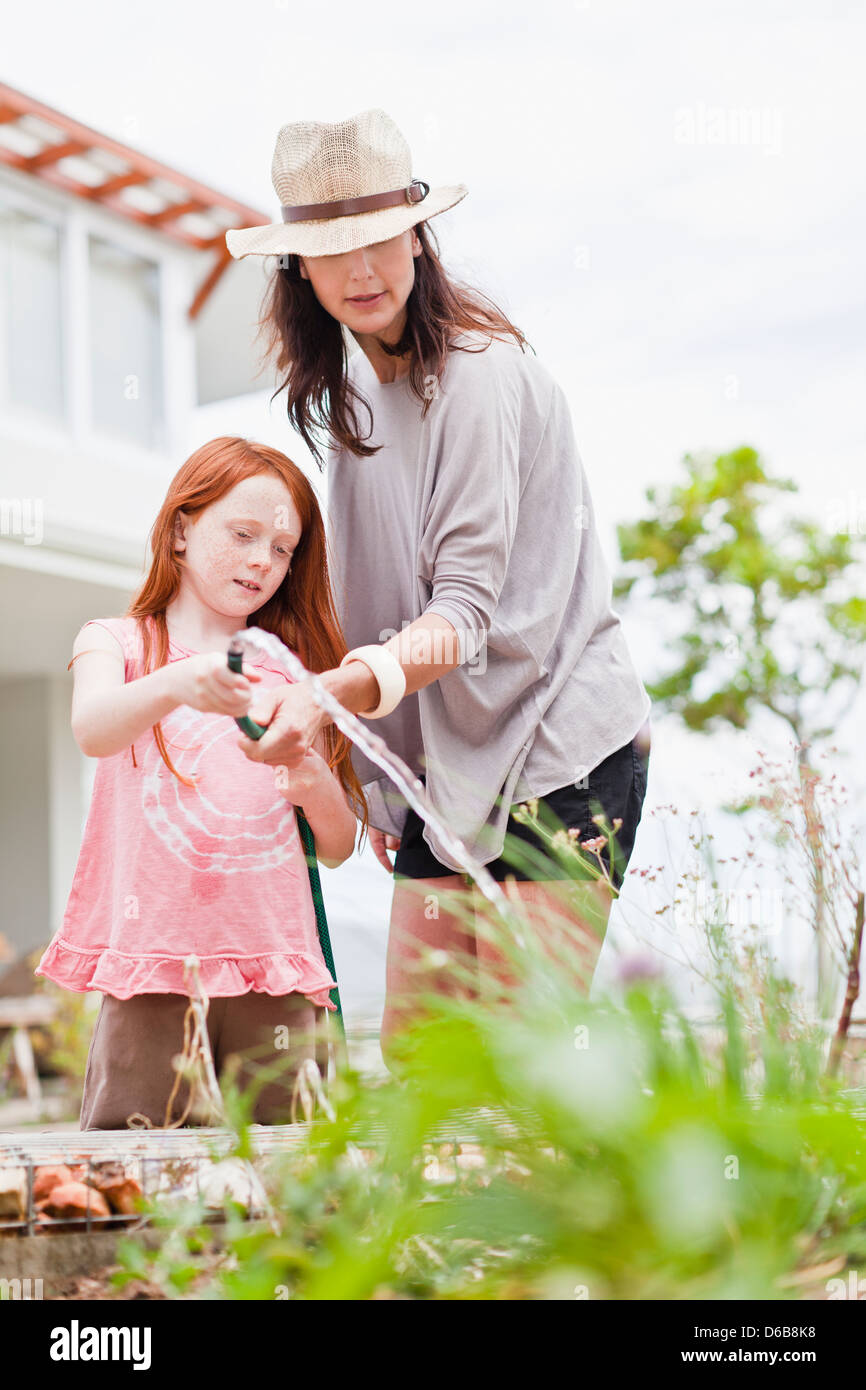 Mother and daughter gardening Stock Photo