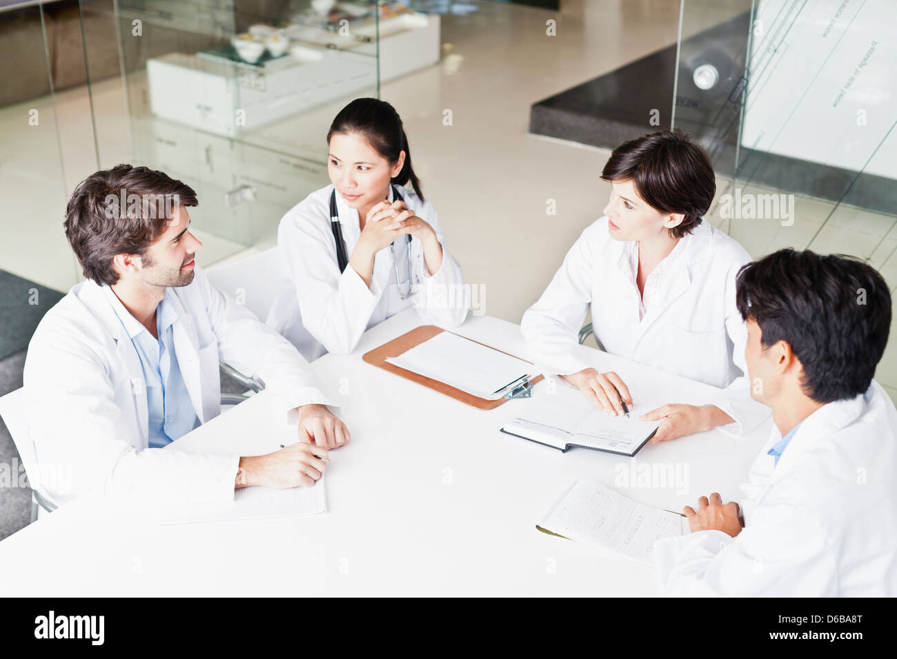 Doctors talking in meeting Stock Photo