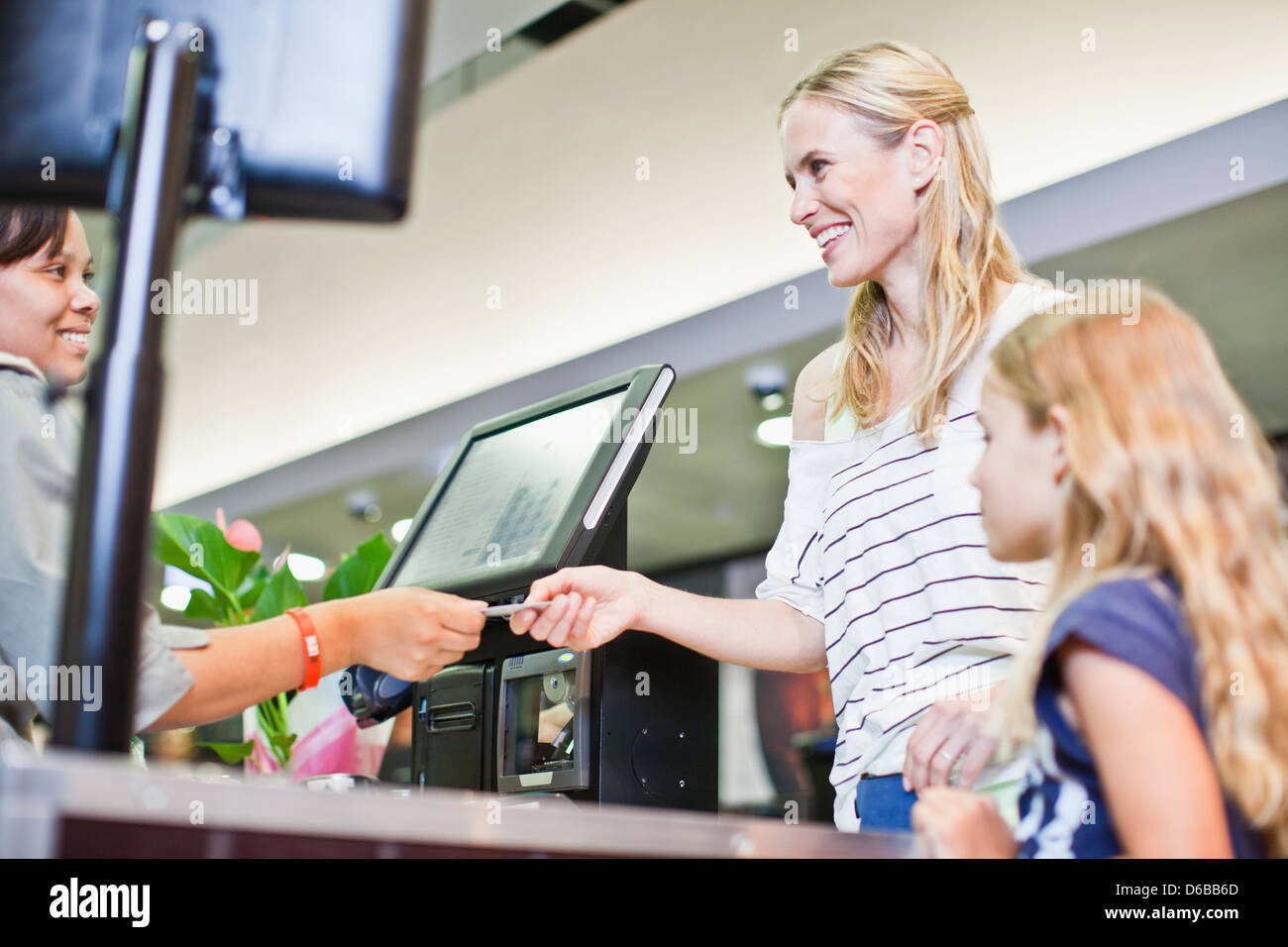 Mother and daughter in grocery store Stock Photo