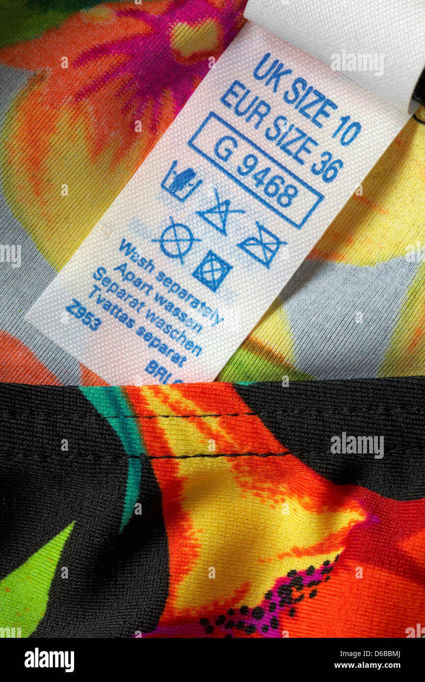 label showing washing instructions in garment, label UK size 10 EUR