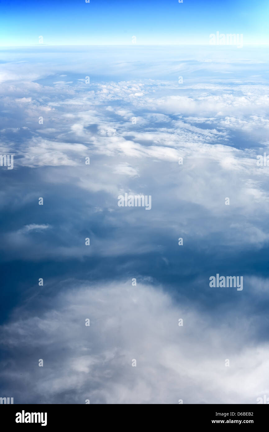 clouds. view from the window of an airplane flying in the clouds Stock ...