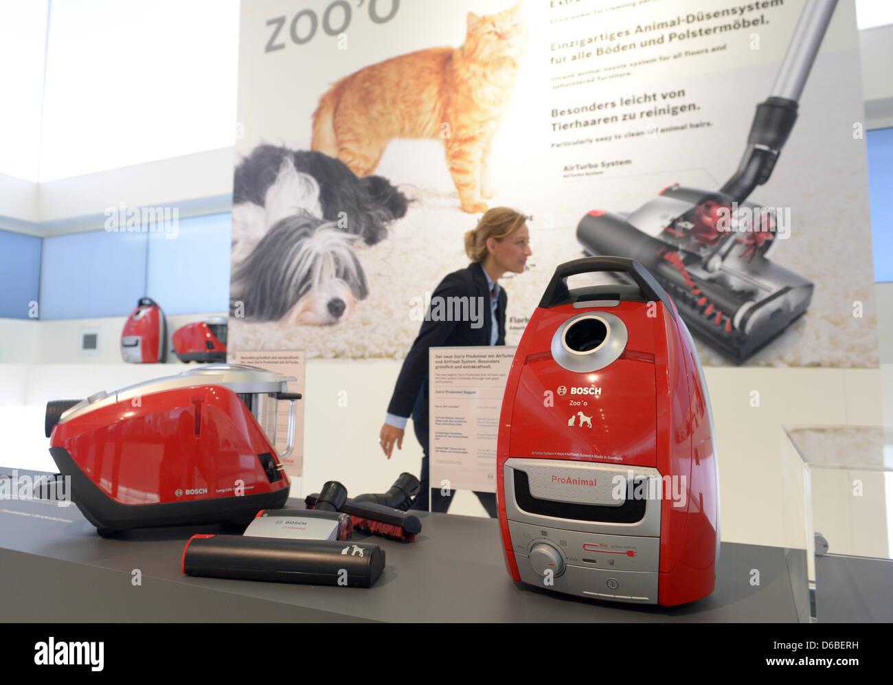 Vacuum cleaners are on display at the booth of German electrical