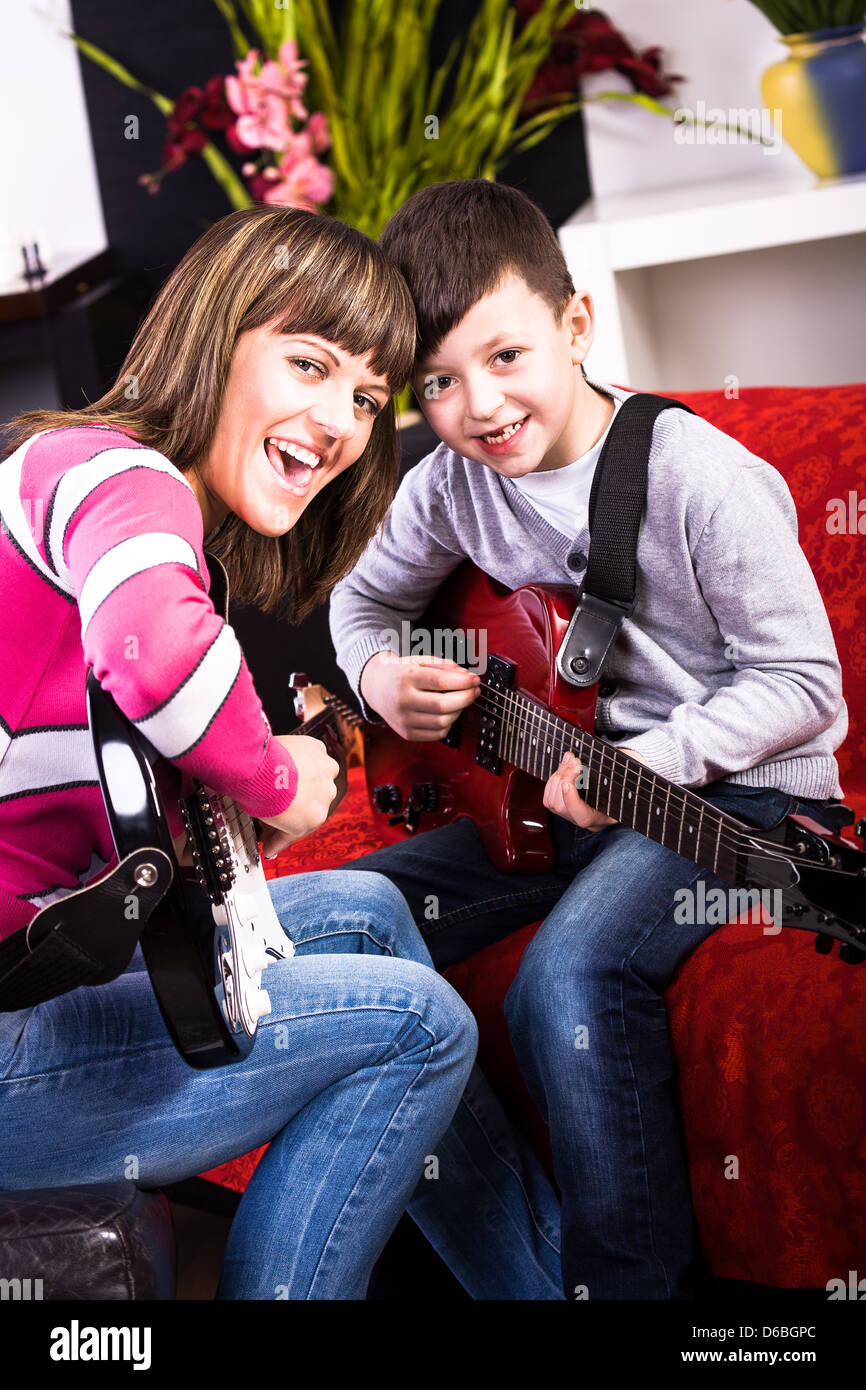 learn play the guitar Stock Photo