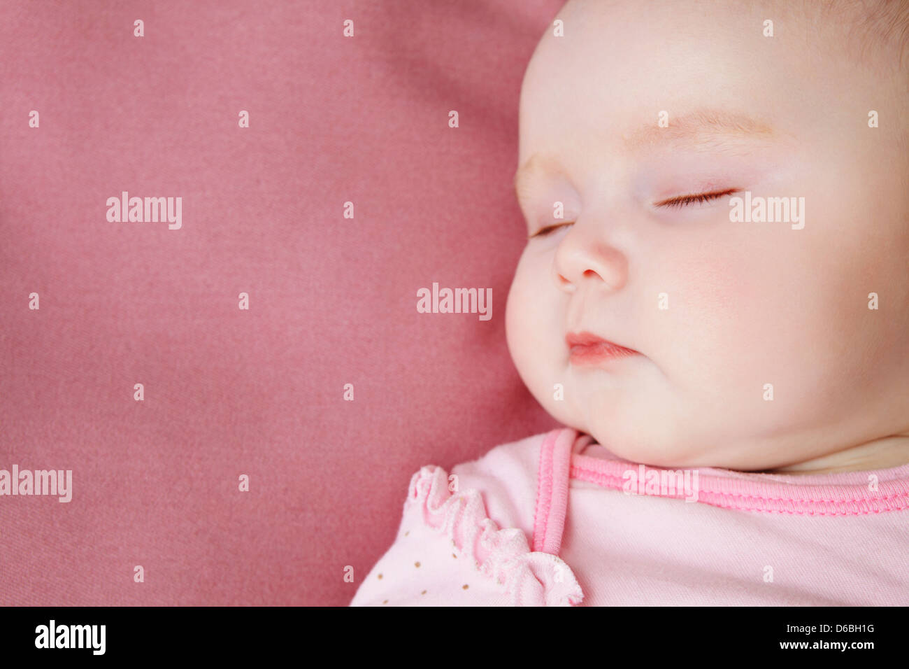 Baby girl sleeping in bed Stock Photo Alamy