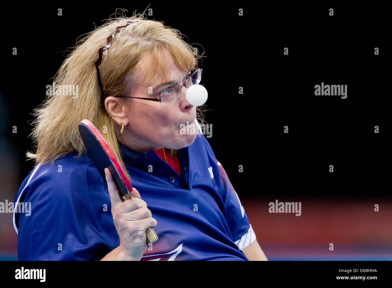 Pamela Fontaine of the USA competes the Table Tennis Women's Singles - Class 3 Preliminary event for the London 2012 Paralympic Games at the ExCel Centre, Great Britain, 31 August 2012. Photo: Daniel Karmann dpa  +++(c) dpa - Bildfunk+++ Stock Photo