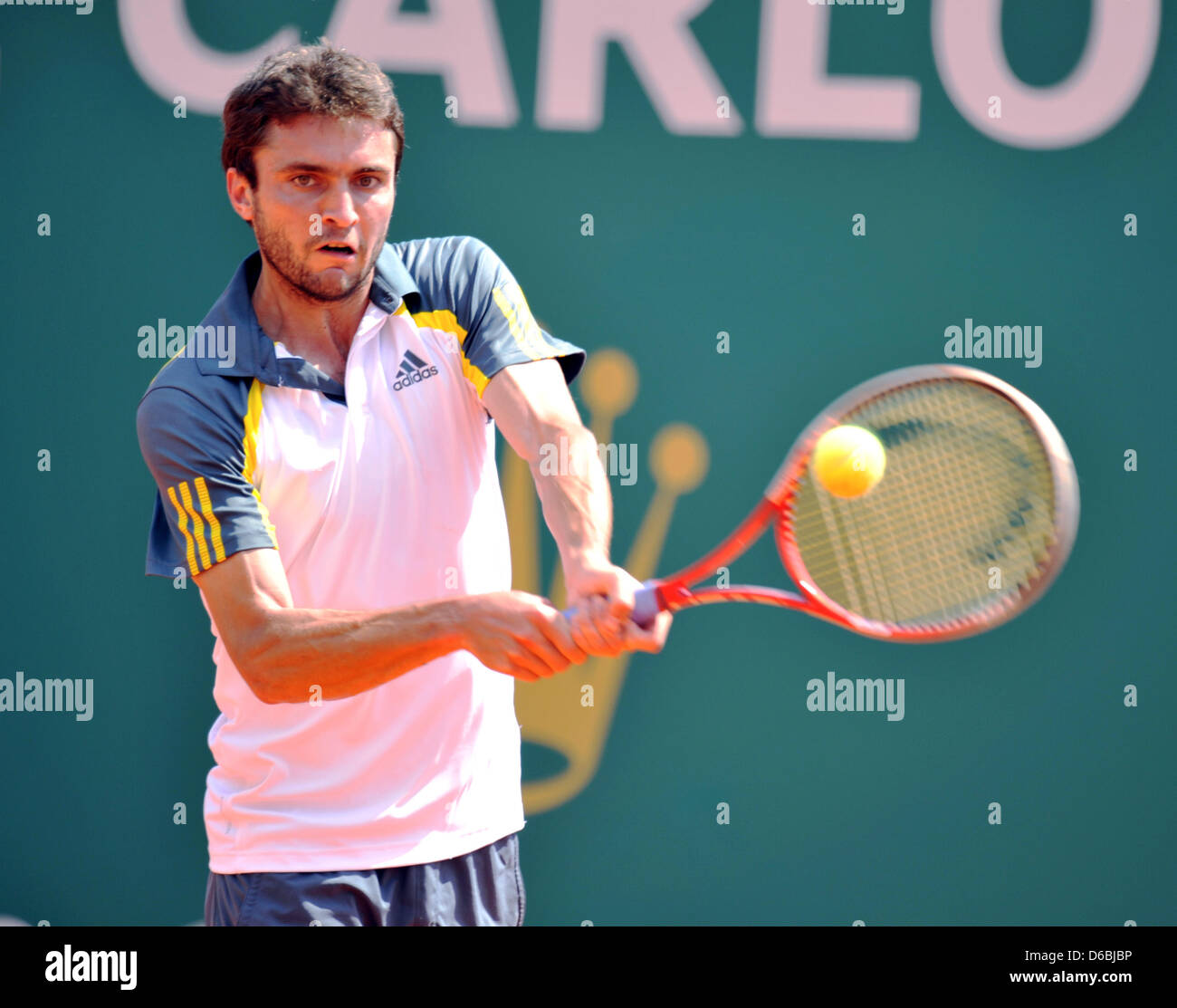 Monte Carlo, Monaco. 15th April, 2013. Rolex Masters Tennis. Gilles Simon (France) hits a backhand. Pic: Neal Simpson/Paul Marriott Photography/Alamy Live News Stock Photo