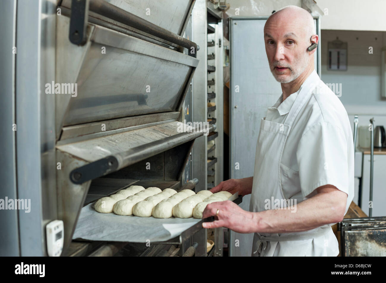 Cambridge, UK. 16th April, 2013. Alan Ackroyd bakes fresh bread at