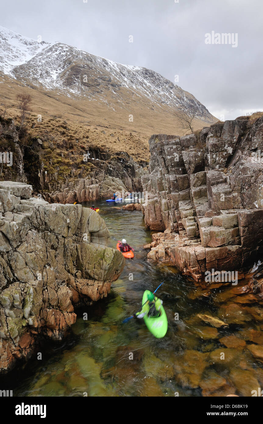 Kayakers in a gorge on the River Etive, Glen Etive, Scottish Highlands Stock Photo