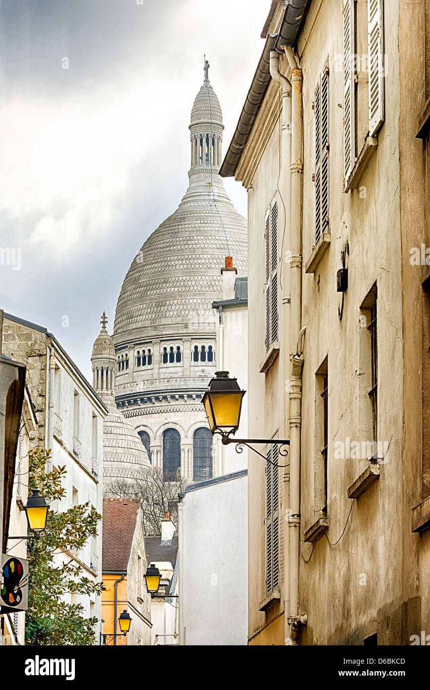 View on Basilica of Sacred Heart from Montmartre street Stock Photo